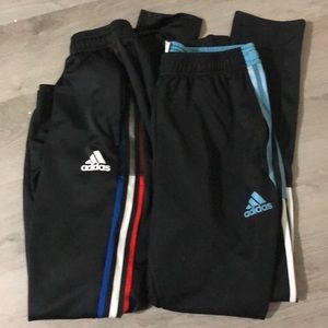 Two pairs men’s adidas pants size medium
